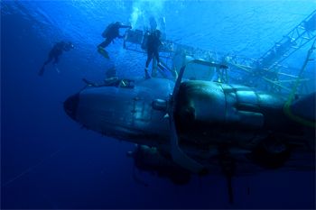 sinking a plane wreck for a new movie, nikon D100,sea&sea... by Leon Joubert 